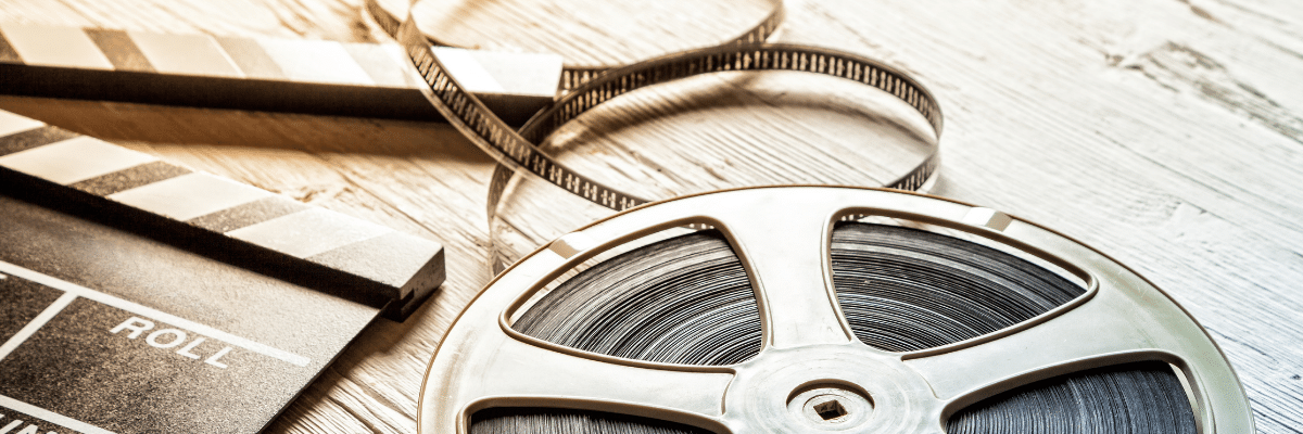 Film Reel On Wooden Table