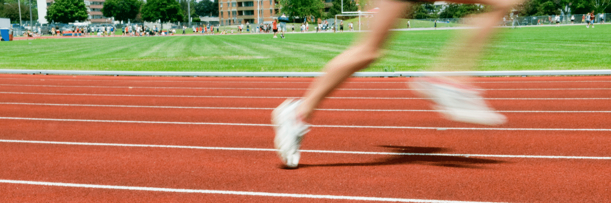 Person Running On A Track